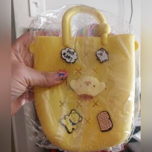 Small Girls Yellow Sanrio croc bag with multi-coloured charms #Sanrio #CrocBag